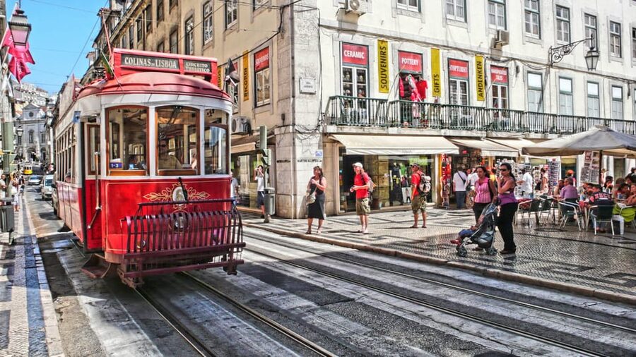 Lisbon's historic old town in a tuk-tuk in German - Key highlights you will feel right away