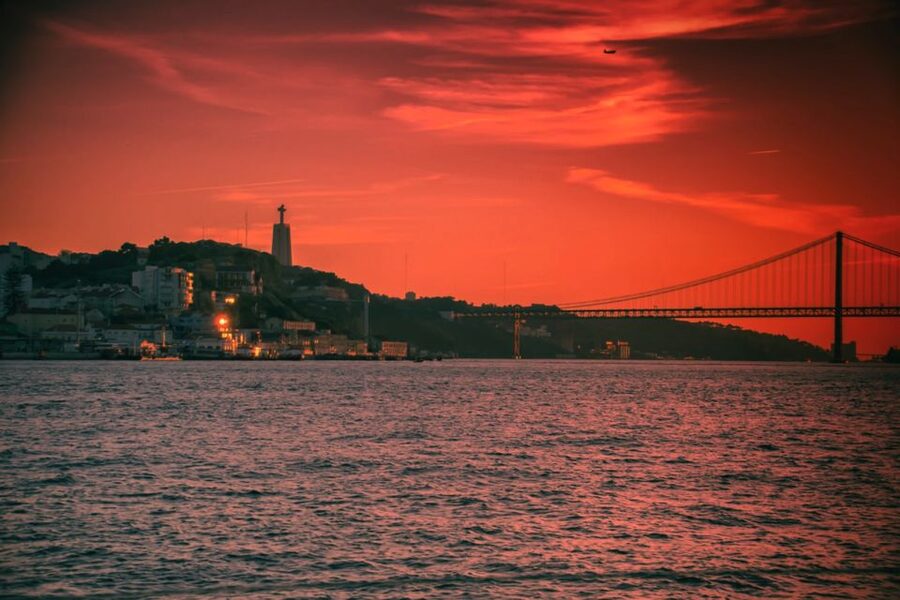 Lisbon: Sailboat Tour w/ Local Guide and Open Bar Green Wine - The Boat Setup: Sofas, Music, and the Comfort That Makes You Stay Longer