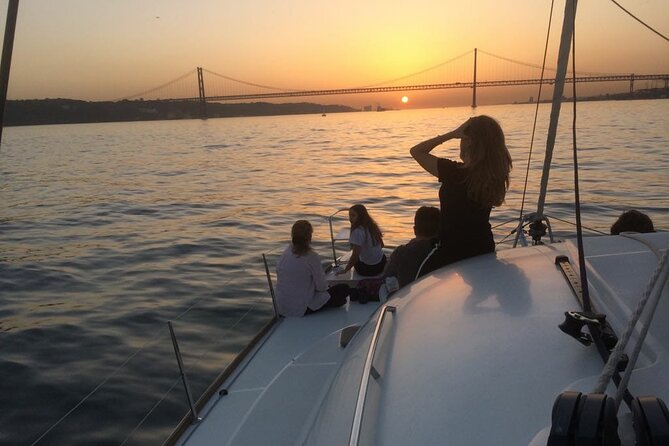 Lisbon Sailing Catamaran Public Cruise with drinks - Leaving Praca do Comercio: The first river photo that sets the tone