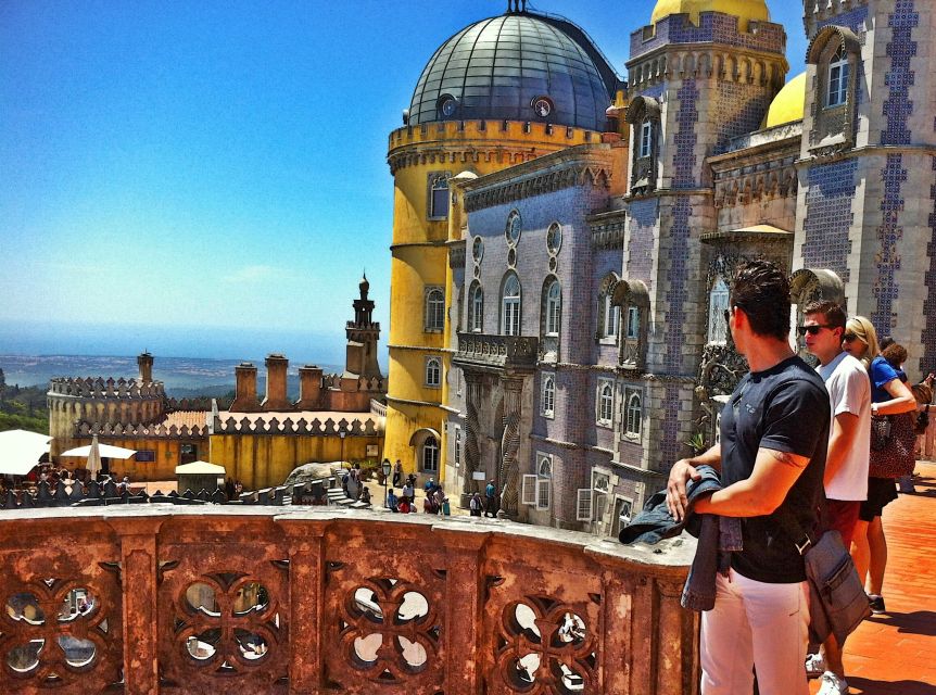 Lisbon: Sintra & Pena Palace Guided Tour with Hotel Pickup - Pena Palace: Romantic extravagance, guided gardens, and smart terrace time