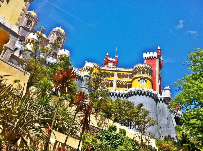 Lisbon: Sintra & Pena Palace Guided Tour with Hotel Pickup - Sintra historical center free time: National Palace vibes and pastry planning