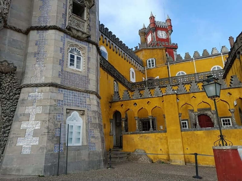 Lisbon: Sintra, Pena Palace, Moorish Castle & Regaleira Tour - Pena Palace: fairytale exterior, timed entry reality