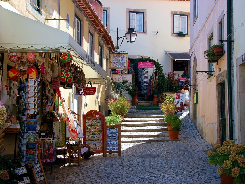 Lisbon: Sintra, Pena Palace, Quinta Regaleira, Cascais Tour - Sintra mountain day begins: Pena Palace gardens first