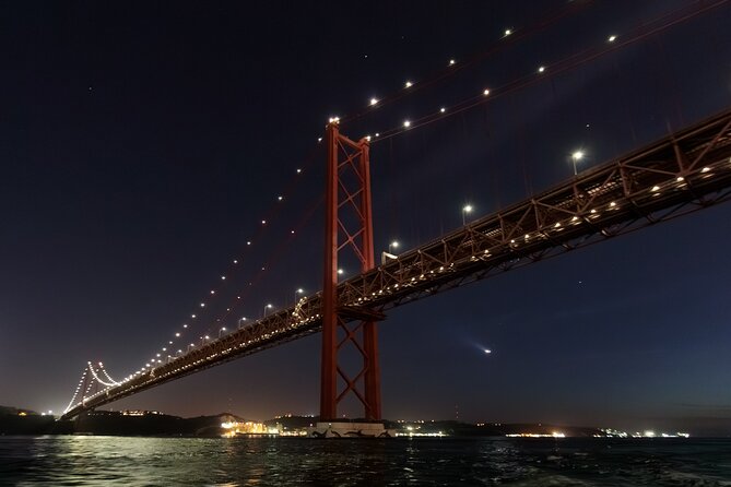Lisbon – Sunset DJ & Porto Tonic Premium Boat Experience - Stop One: Under the 25 de Abril Bridge for the red-bridge photo moment