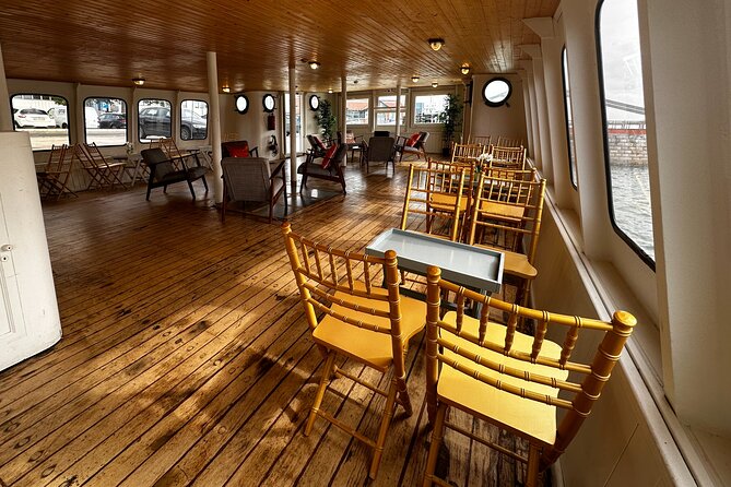 Lisbon: Sunset on board with music & drinks - Belém From Water Level: Tower of Belém and the Discoveries Monument