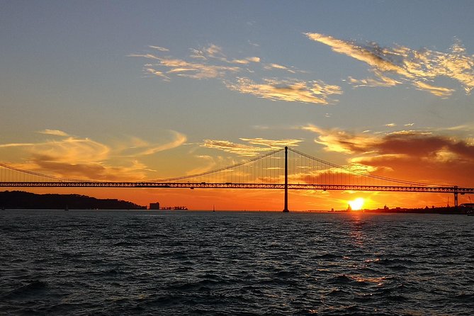 Lisbon Sunset Sailing Tour on Luxury Sailing Yacht with 2 Drinks - The yacht, the seating, and how to get the best views