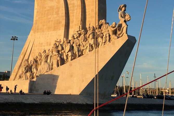 Lisbon: Sunset Sailing with Portuguese Wine and History - Cristo Rei: a viewpoint effect that makes the city feel layered