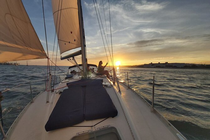 Lisbon: Sunset Sailing with Portuguese Wine and History - 25 de Abril Bridge: watching Lisbon’s modern icon stretch across the sunset