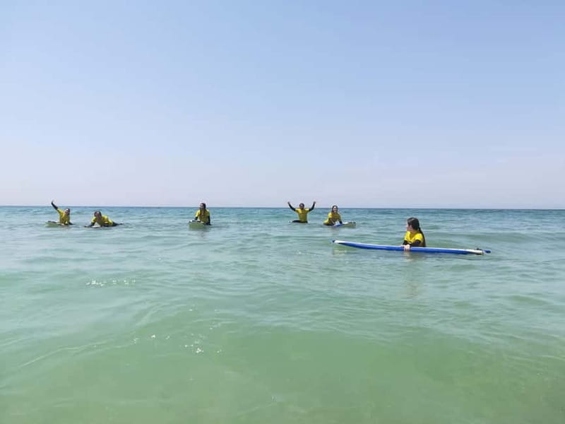 Lisbon: Surfing Lesson on Costa de Caparica Beach - Finding SurfChamp at the meeting point (and what to bring from the start)