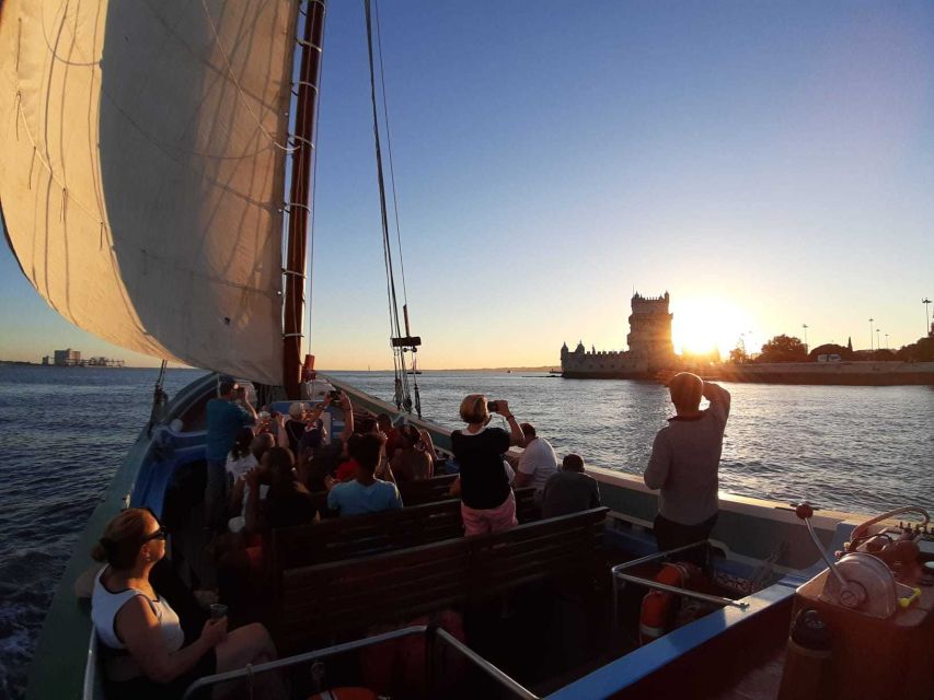 Lisbon: Tagus River Sunset Cruise in a Traditional Vessel - White Wine, Music, and Live Commentary That Keeps It Fun