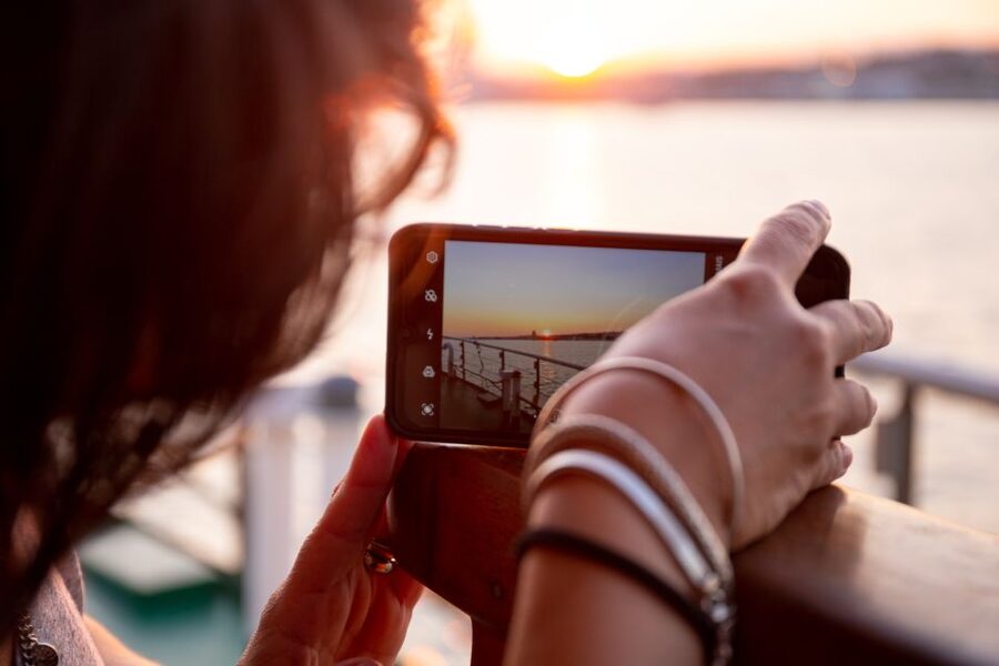 Lisbon: Tagus River Sunset Tour with Snacks and Drink - Belém Tower at dusk: watching the water turn mirror-like