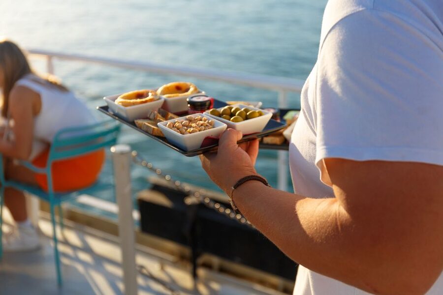 Lisbon: Tagus River Sunset Tour with Snacks and Drink - On-board comfort: decks, seating, and the first-52 sundeck rule