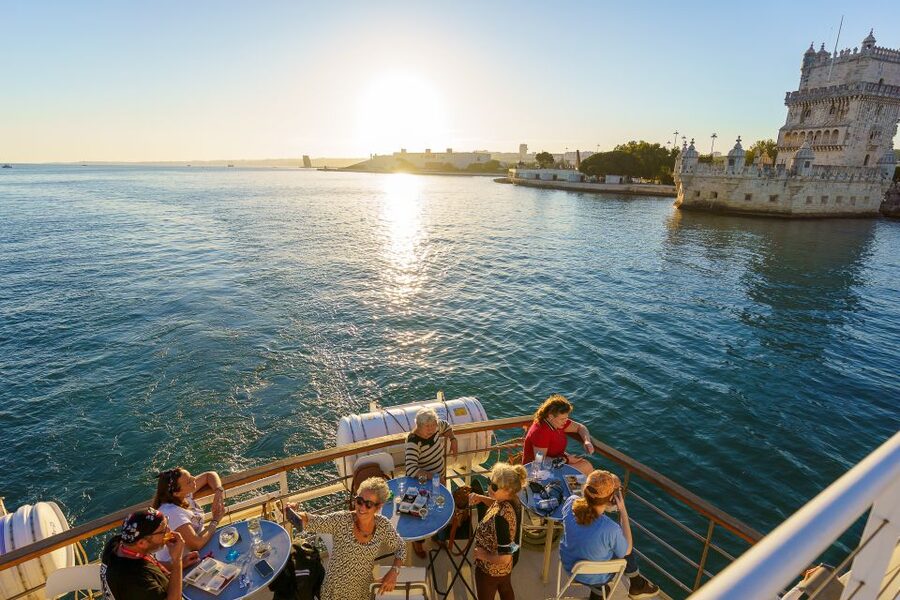 Lisbon: Tagus River Sunset Tour with Snacks and Drink - Audio guide on your phone: turning pass-by sights into context