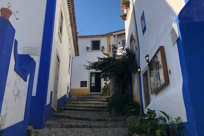 Lisbon to Fatima/Batalha/Nazare & Obidos guided tour 8pax group - Óbidos Town: Medieval Walls, Shopping Stops, and Ginja in Chocolate