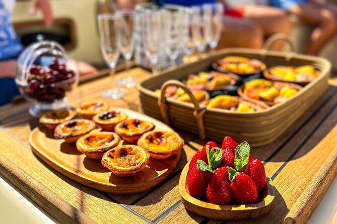 Lisbon – Vinho Verde Wine Premium Boat Experience - Porto Tonic, Vinho Verde Casal Garcia, sangria, and the snack spread