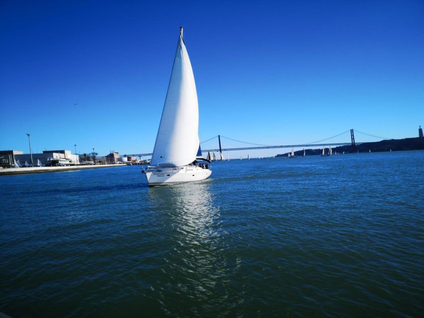 Lisbon: Yacht Sailing Tour With Portuguese Wine and History - Praça do Comércio, Baixa Lisbon, and the City Unfolding