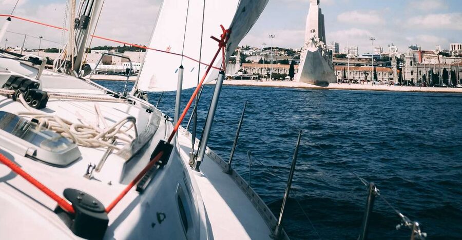 Lisbon: Yacht Sailing Tour With Portuguese Wine and History - From Doca de Santo Amaro to 25 de Abril Bridge Views