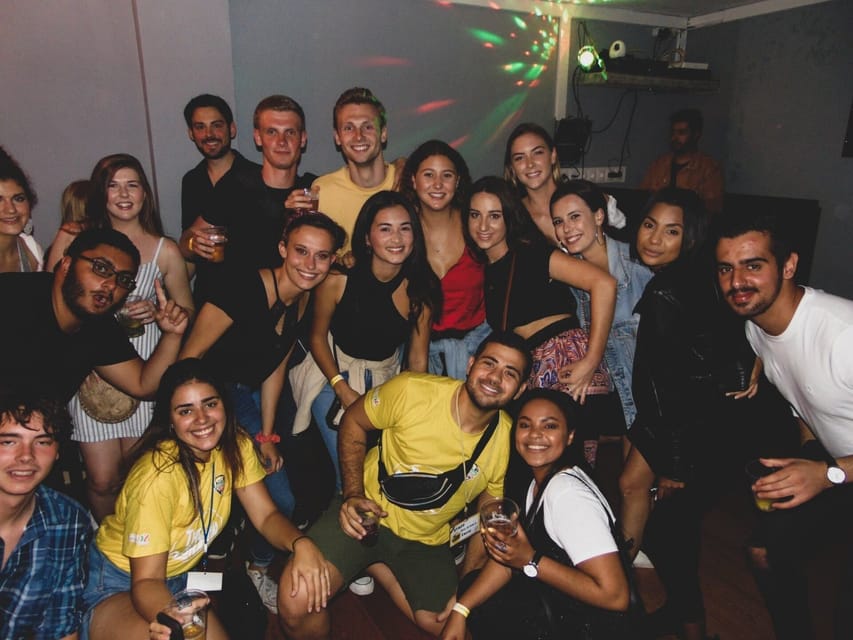 NYE Pub Crawl + VIP Club Entry - Camões Square at 9:30 PM, party kit in hand