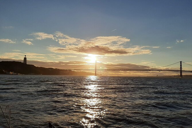 Relaxing Sailboat Cruise along the Tagus - Cristo Rei From the Water: A Different Faith-and-City Perspective