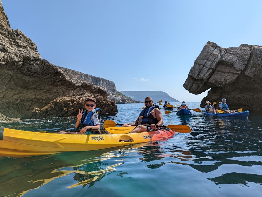 Sesimbra: Arrabida Natural Park & Caves Guided Kayaking Tour - Ribeiro do Cavalo Beach Stop: Swim, Photos, and Traditional Sweets