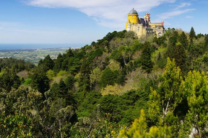 Sintra & Cascais Day Tour with Pena Palace Entry and Gardens Walk - Lisbon pickup and the drive that sets the tone
