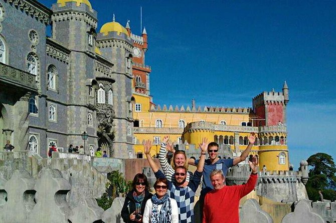 Sintra & Cascais Day Tour with Pena Palace Entry and Gardens Walk - Sintra village free time, pastries, souvenirs, and pacing