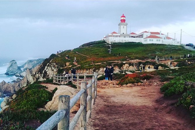 Sintra Half-Day Private Tour - A Journey through Wonderland - Quinta da Regaleira: Caves, Secret Wells, and Garden Theater