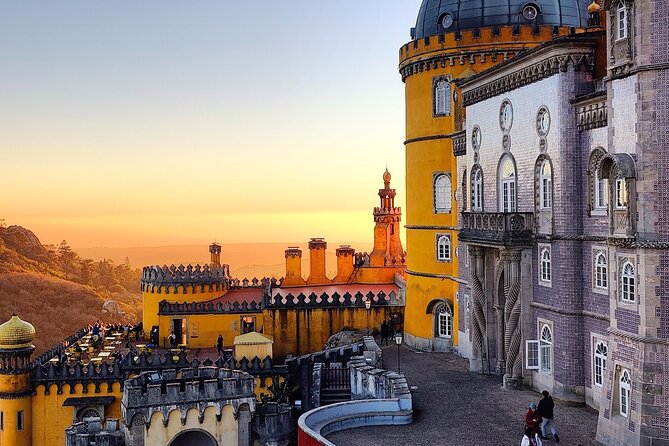 Sintra Half Day with Pena Palace and Regaleira from Lisbon - Quinta da Regaleira: gardens, grottoes, and the Initiation Well