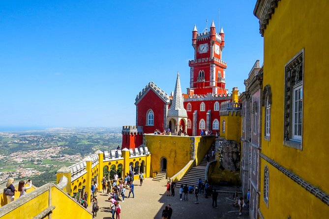 Sintra, Pena Palace, Quinta da Regaleira & Cascais Group Tour - Quinta da Regaleira: The Initiation Well and Symbolism You Can Read