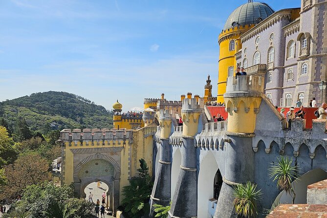 Sintra, Pena Palace, Quinta da Regaleira & Cascais Group Tour - Serpentine Drives and Atlantic Breaks: The Guincho Beach Photo Stop