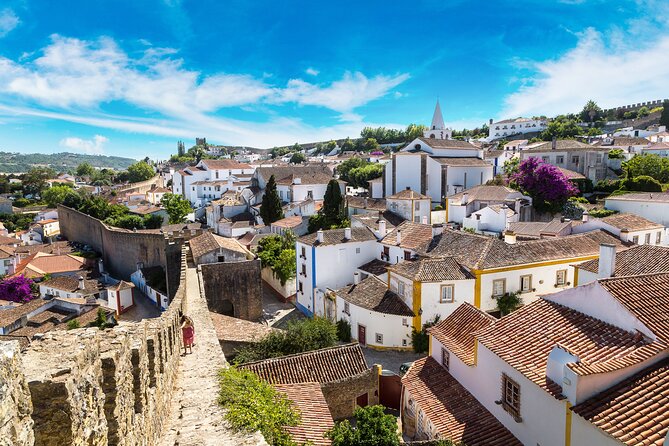 Three Cities in One Day: Porto, Nazare and Obidos from Lisbon - Nazaré and Forte de São Miguel: surf legend plus a view hike